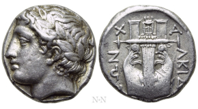 ATTICA. Athens. Tetradrachm (Circa 485/0 BC). Obv: Helmeted archaic head of Athena right, with frontal eye. Rev: AΘE. Owl standing right, head facing; olive sprig and crescent to left; all within incuse square. Seltman Group F; HGC 4, 1591. Condition: Good very fine, test cut on the obverse. Weight: 17.41 g. Diameter: 22 mm.